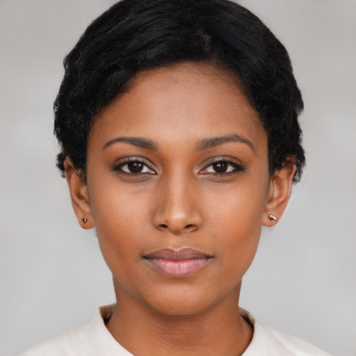 Neutral black young-adult female with short  black hair and brown eyes