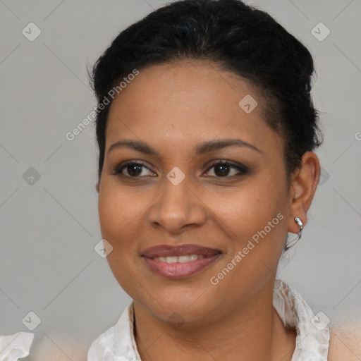 Joyful latino young-adult female with short  brown hair and brown eyes