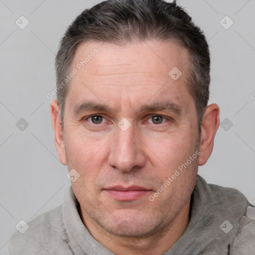 Neutral white adult male with short  brown hair and brown eyes