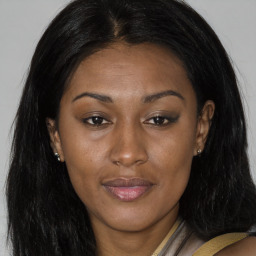 Joyful latino adult female with long  brown hair and brown eyes
