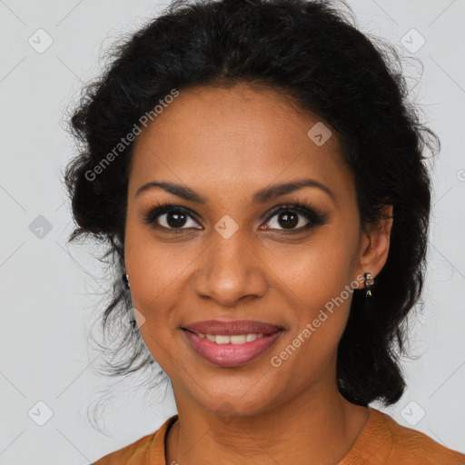 Joyful black young-adult female with long  brown hair and brown eyes