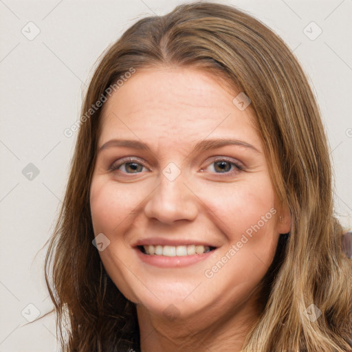 Joyful white young-adult female with long  brown hair and brown eyes