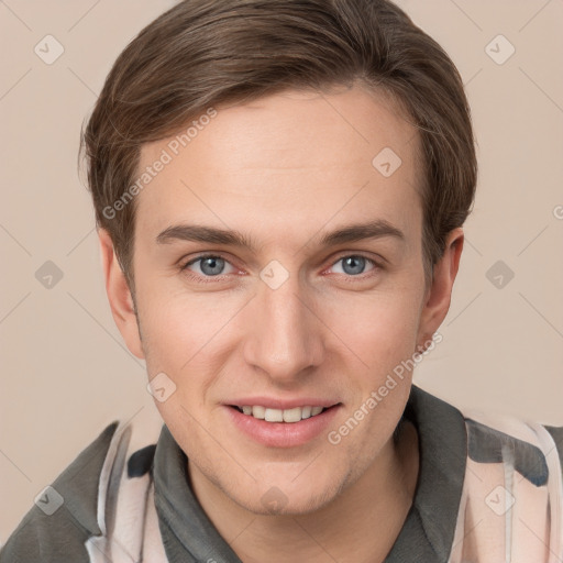 Joyful white young-adult male with short  brown hair and grey eyes