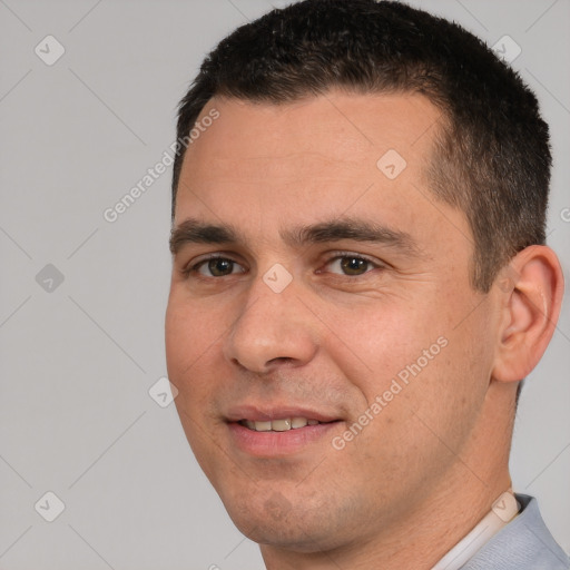 Joyful white young-adult male with short  brown hair and brown eyes