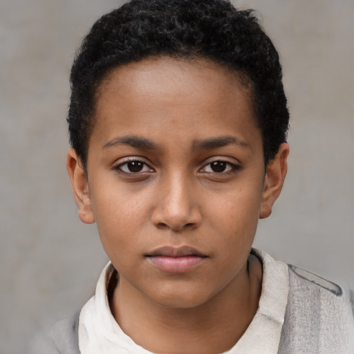 Neutral black child female with short  black hair and brown eyes