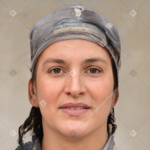 Joyful white adult female with short  brown hair and brown eyes