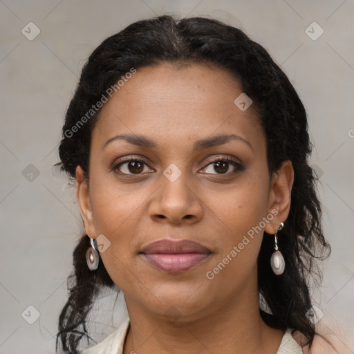 Joyful black young-adult female with medium  brown hair and brown eyes