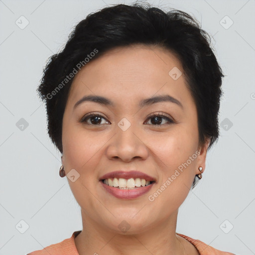 Joyful asian young-adult female with short  brown hair and brown eyes