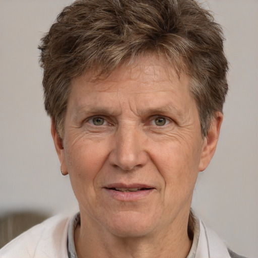 Joyful white middle-aged male with short  brown hair and brown eyes