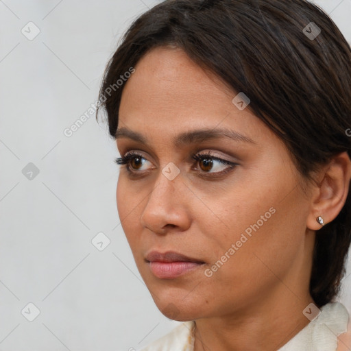 Neutral white young-adult female with medium  brown hair and brown eyes