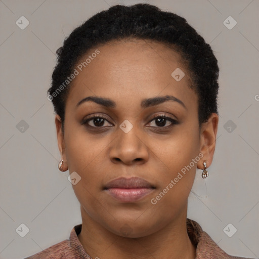 Joyful black young-adult female with short  black hair and brown eyes