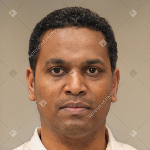 Neutral latino young-adult male with short  brown hair and brown eyes