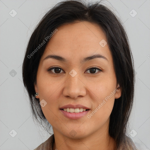 Joyful asian young-adult female with medium  brown hair and brown eyes