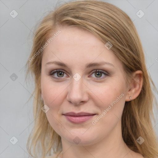 Joyful white young-adult female with medium  brown hair and blue eyes