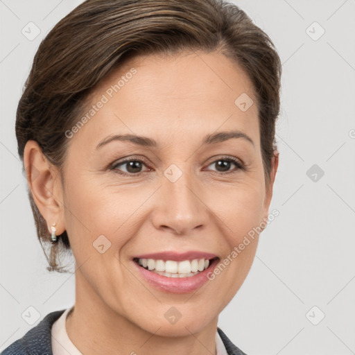 Joyful white adult female with medium  brown hair and brown eyes