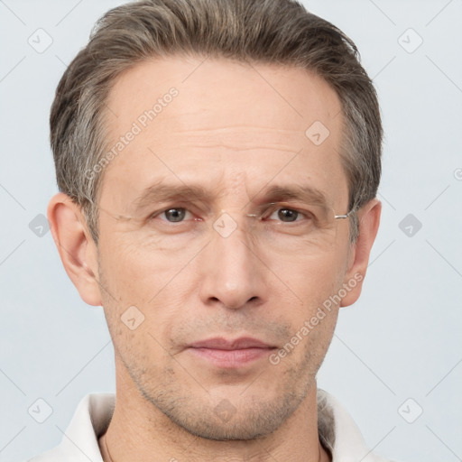 Neutral white adult male with short  brown hair and brown eyes