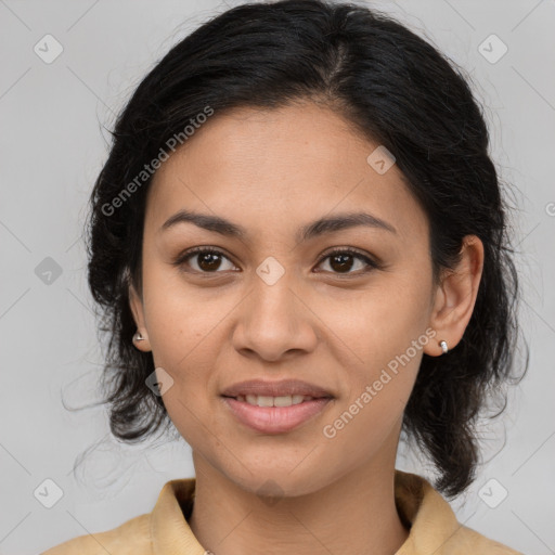 Joyful latino young-adult female with medium  brown hair and brown eyes