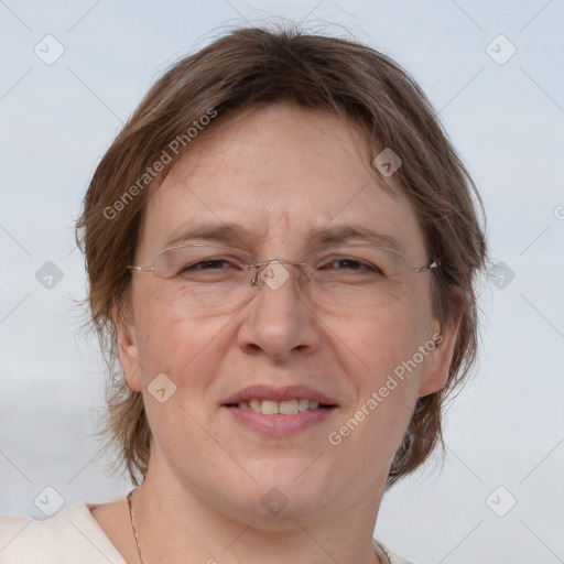 Joyful white adult female with medium  brown hair and grey eyes