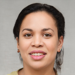 Joyful asian young-adult female with medium  brown hair and brown eyes