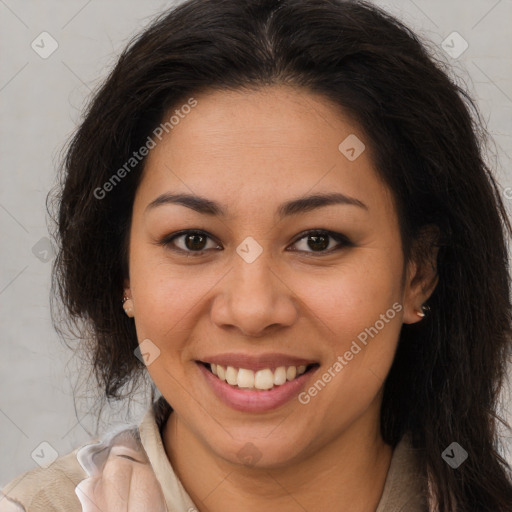 Joyful latino young-adult female with long  brown hair and brown eyes