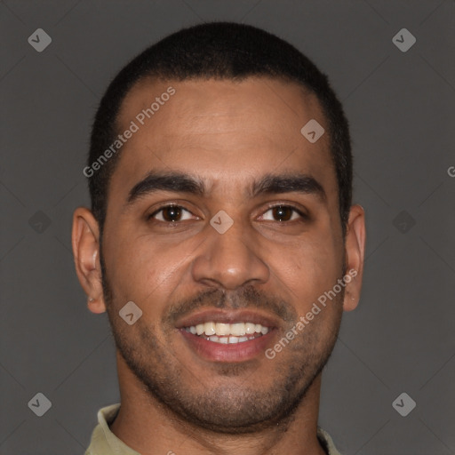 Joyful black young-adult male with short  brown hair and brown eyes