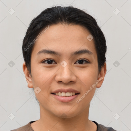 Joyful asian young-adult female with short  brown hair and brown eyes