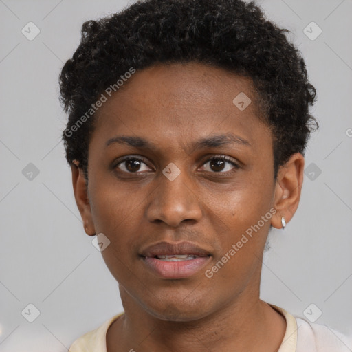 Joyful black young-adult male with short  brown hair and brown eyes