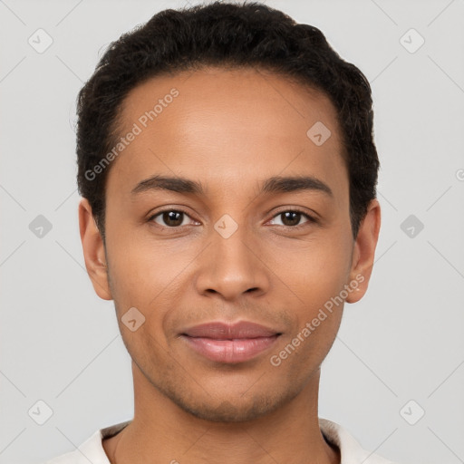 Joyful latino young-adult male with short  brown hair and brown eyes