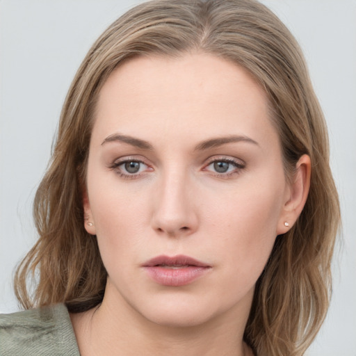 Neutral white young-adult female with medium  brown hair and blue eyes