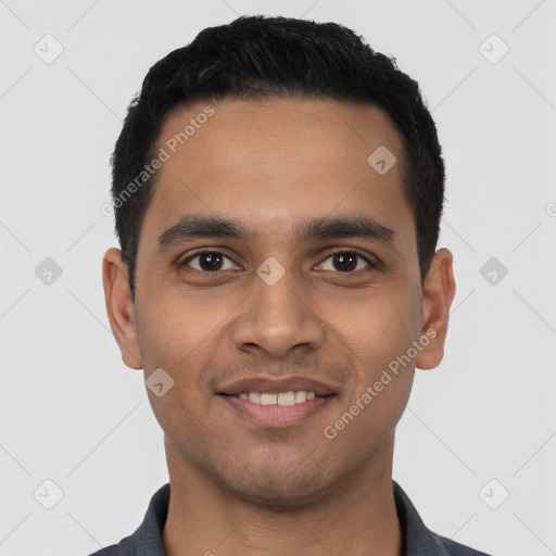 Joyful latino young-adult male with short  black hair and brown eyes