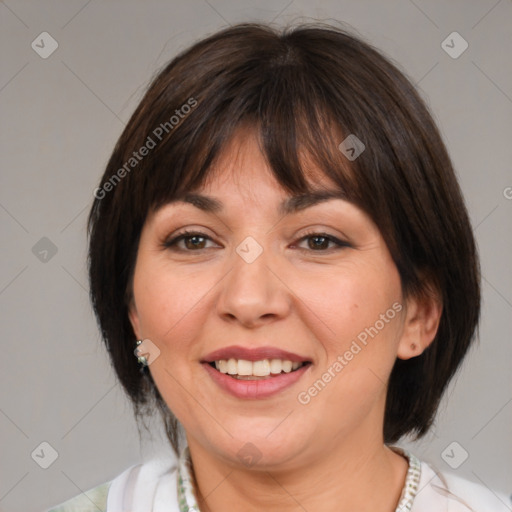 Joyful white adult female with medium  brown hair and brown eyes