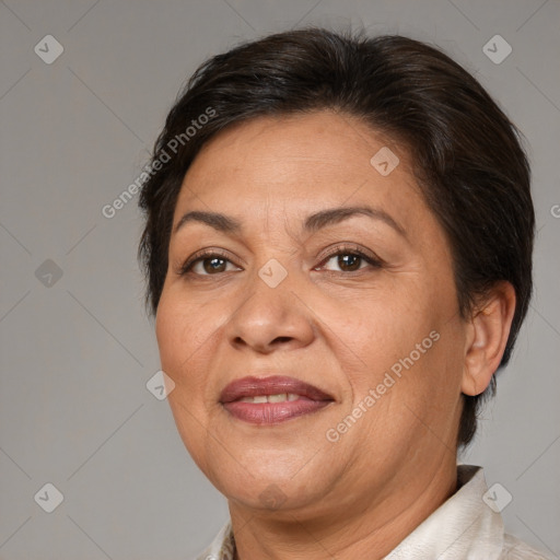 Joyful white adult female with medium  brown hair and brown eyes