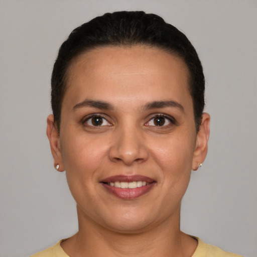 Joyful white young-adult female with short  brown hair and brown eyes