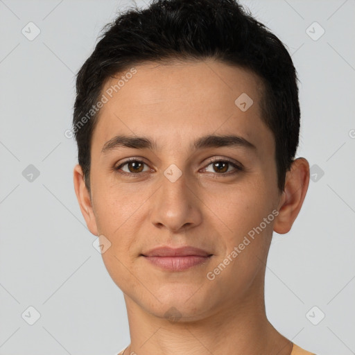 Joyful white young-adult male with short  black hair and brown eyes