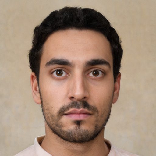 Neutral white young-adult male with short  black hair and brown eyes