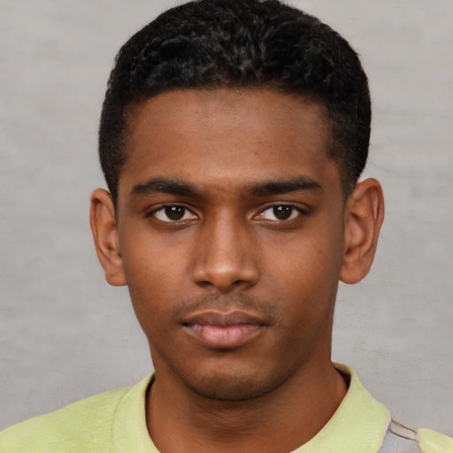 Neutral black young-adult male with short  black hair and brown eyes