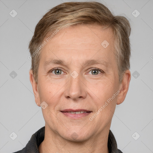 Joyful white adult male with short  brown hair and grey eyes