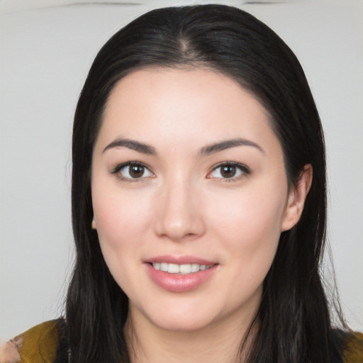 Joyful white young-adult female with long  black hair and brown eyes