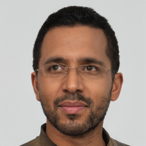 Neutral black adult male with short  black hair and brown eyes