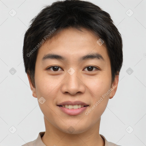 Joyful asian young-adult male with short  brown hair and brown eyes