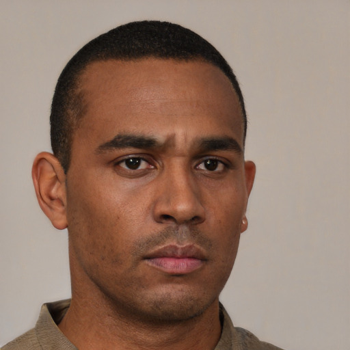 Neutral latino young-adult male with short  brown hair and brown eyes