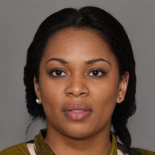 Joyful black young-adult female with medium  black hair and brown eyes