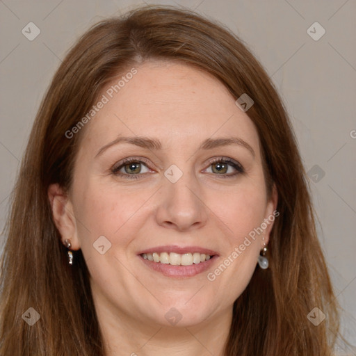 Joyful white adult female with long  brown hair and green eyes