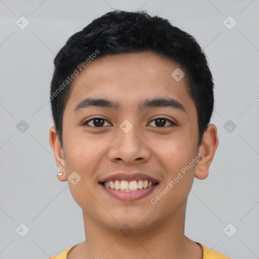 Joyful latino young-adult male with short  black hair and brown eyes