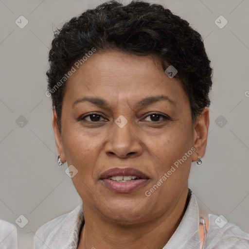 Joyful latino adult female with short  brown hair and brown eyes