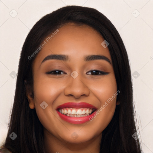 Joyful latino young-adult female with long  black hair and brown eyes