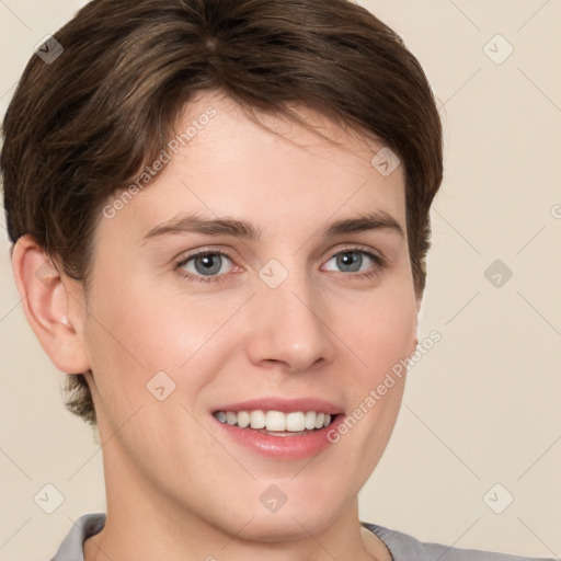 Joyful white young-adult female with short  brown hair and grey eyes