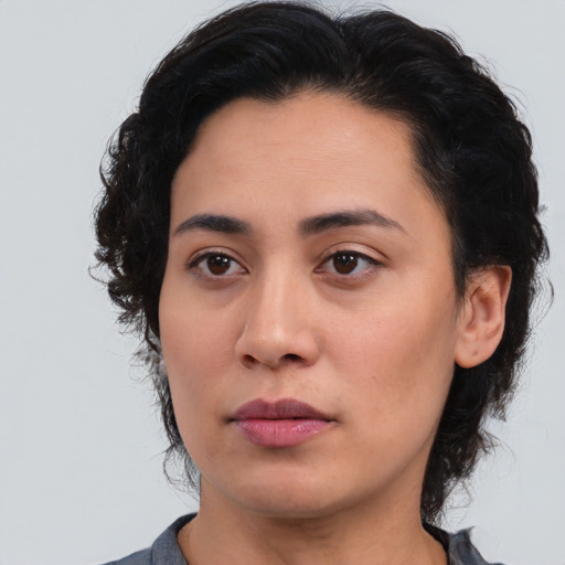 Neutral latino young-adult female with medium  black hair and brown eyes