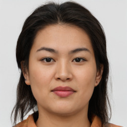 Joyful asian young-adult female with medium  brown hair and brown eyes