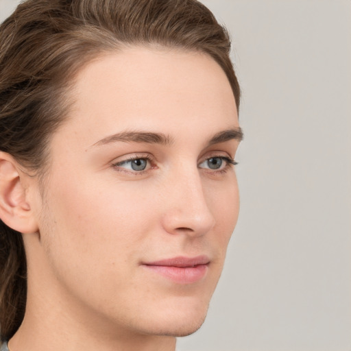 Neutral white young-adult female with medium  brown hair and grey eyes